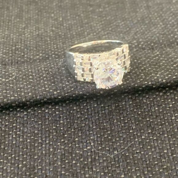 5.5 DEW  center stone with 3 rows of rounds . Rhodium plated . Size 10 - Picture 3 of 5